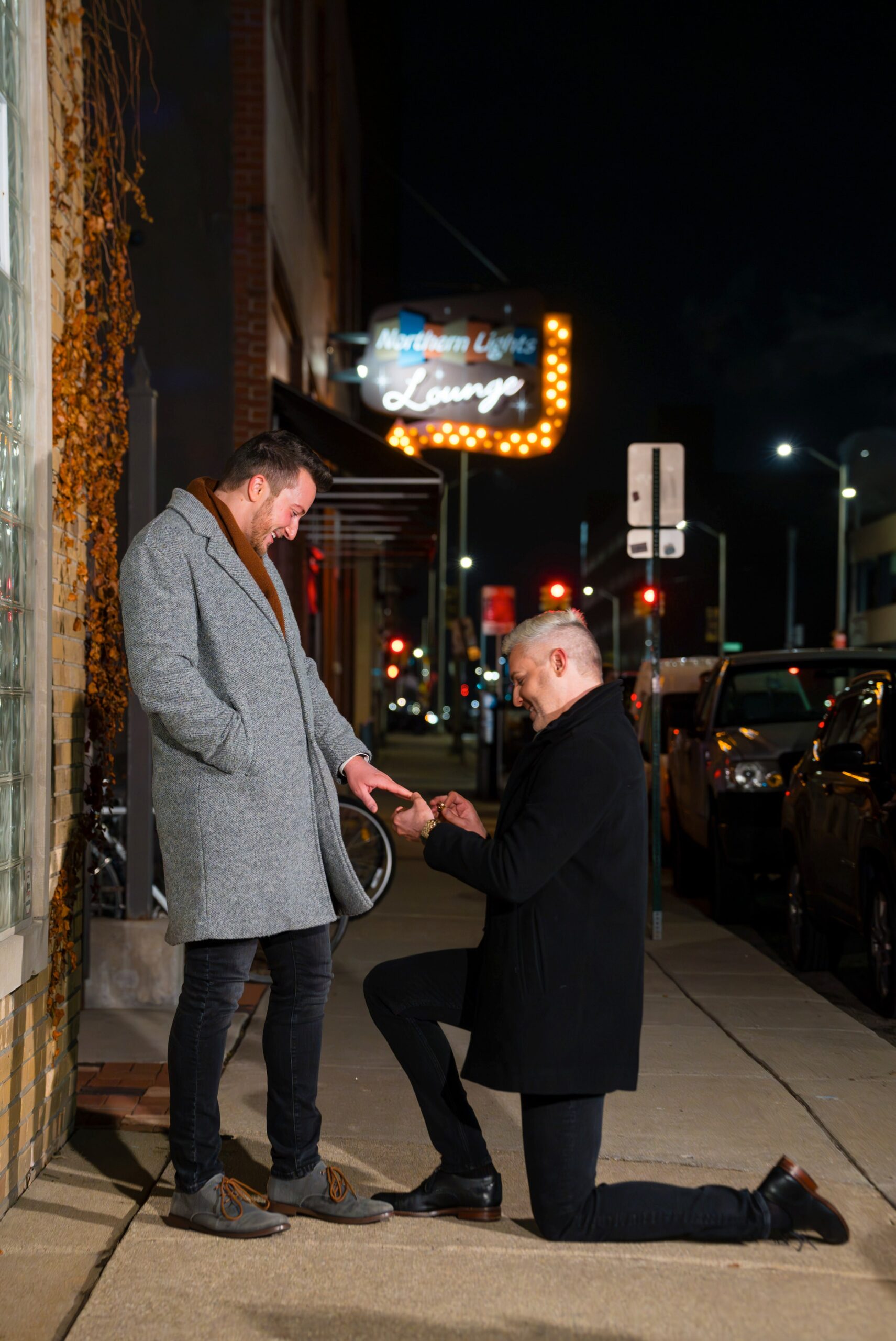 A Northern Lights proposal takes place in New Center Detroit outside on a winter night.  