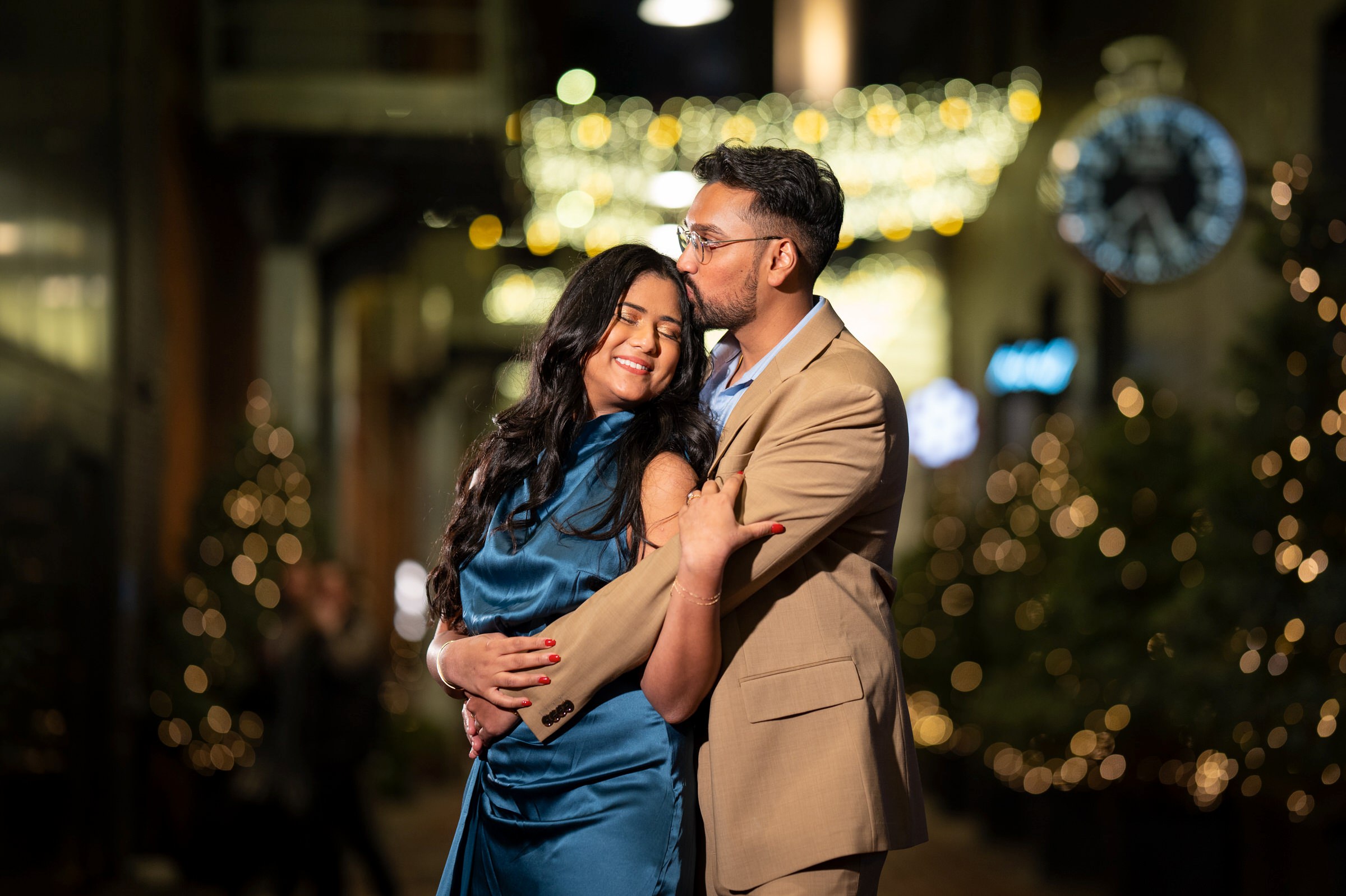 An Indian couple embraces in Parker's Alley following their Shinola Hotel proposal. 