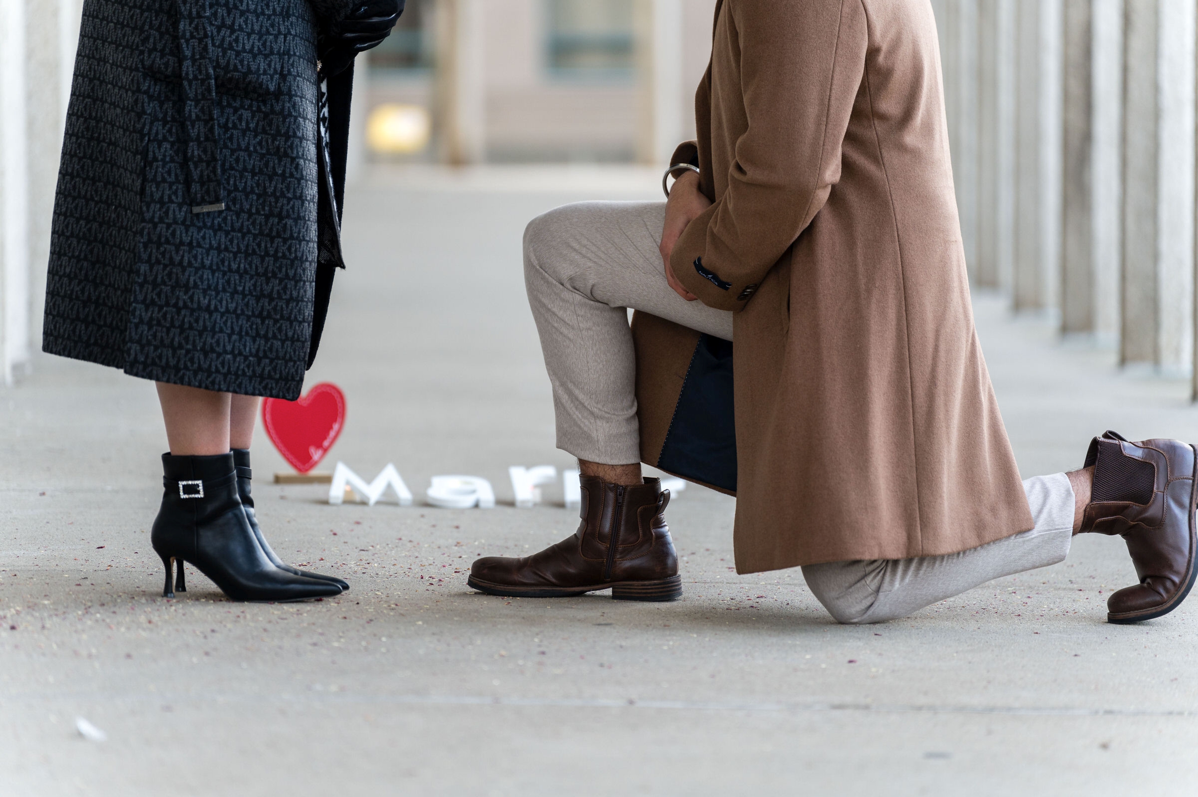 The shoes of a couple during a WSU proposal. 