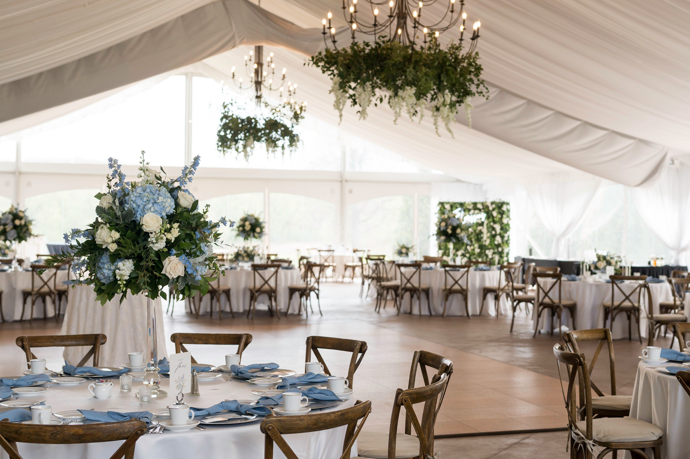 Tables adorned with flowers during wedding at meadow brook hall 