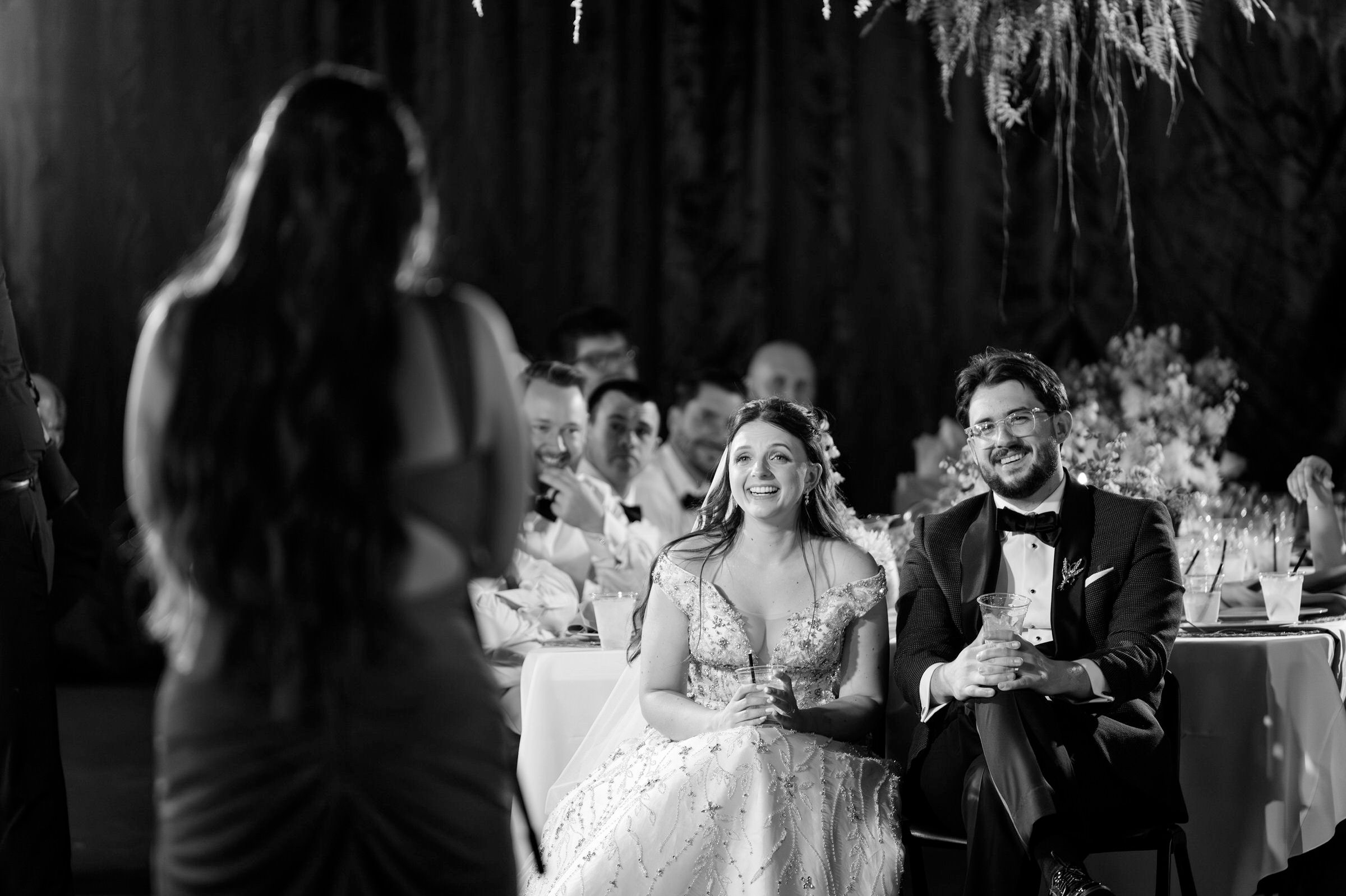 Sister giving speech during Royal Oak Farmers Market wedding 