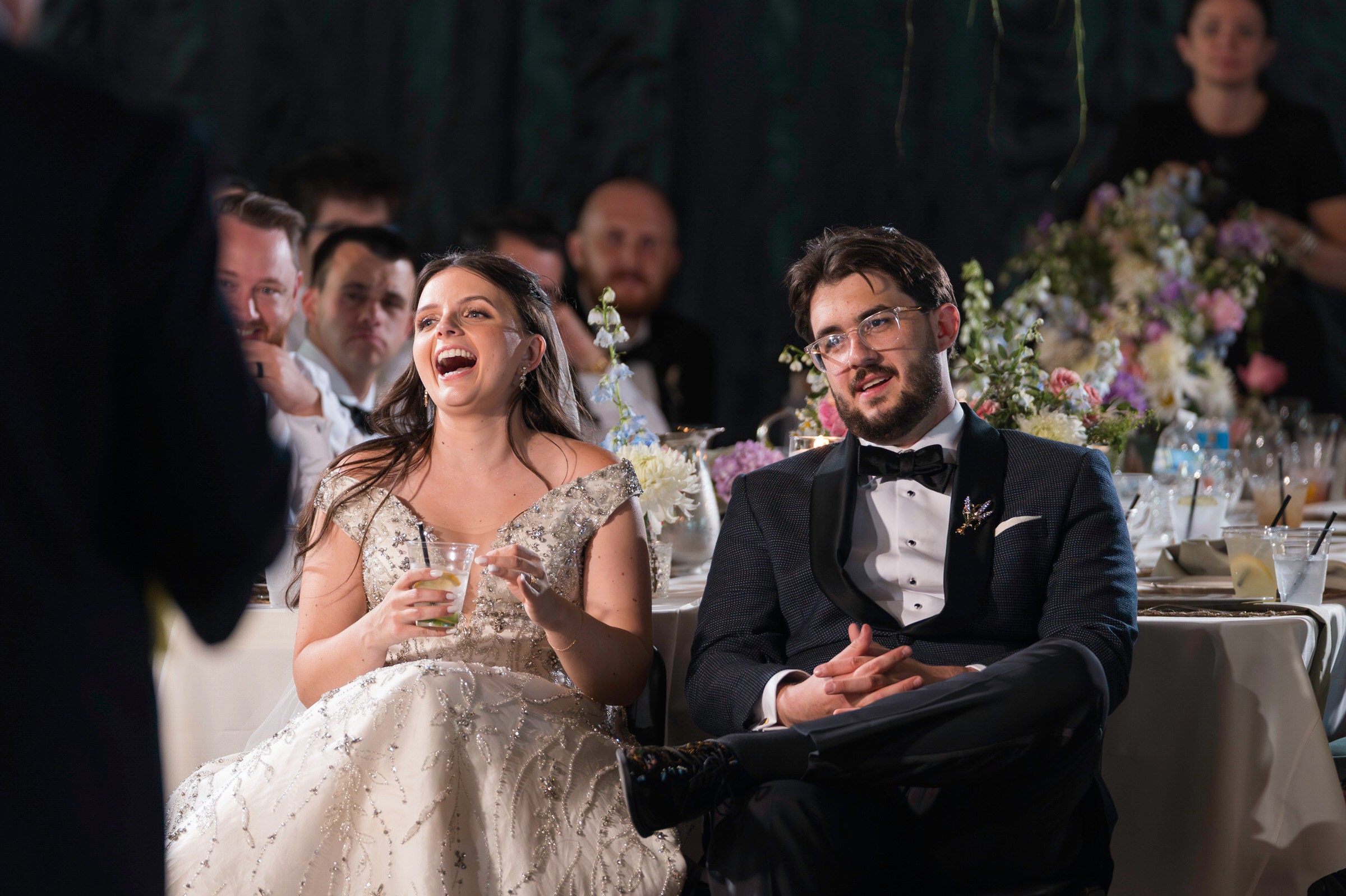 Brides reaction with laughter during speeches 
