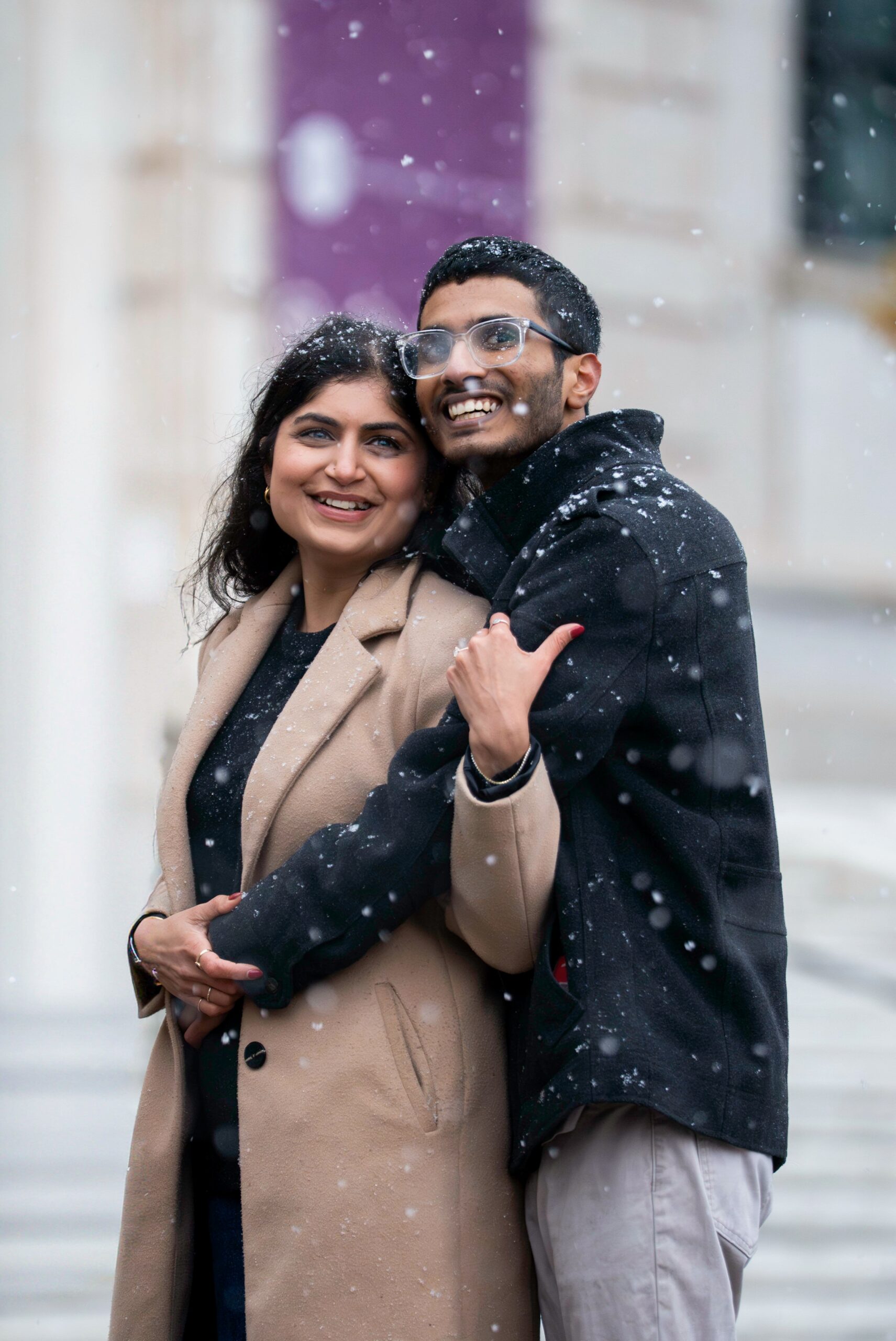 Snow falls on couple during surprise DIA proposal.  