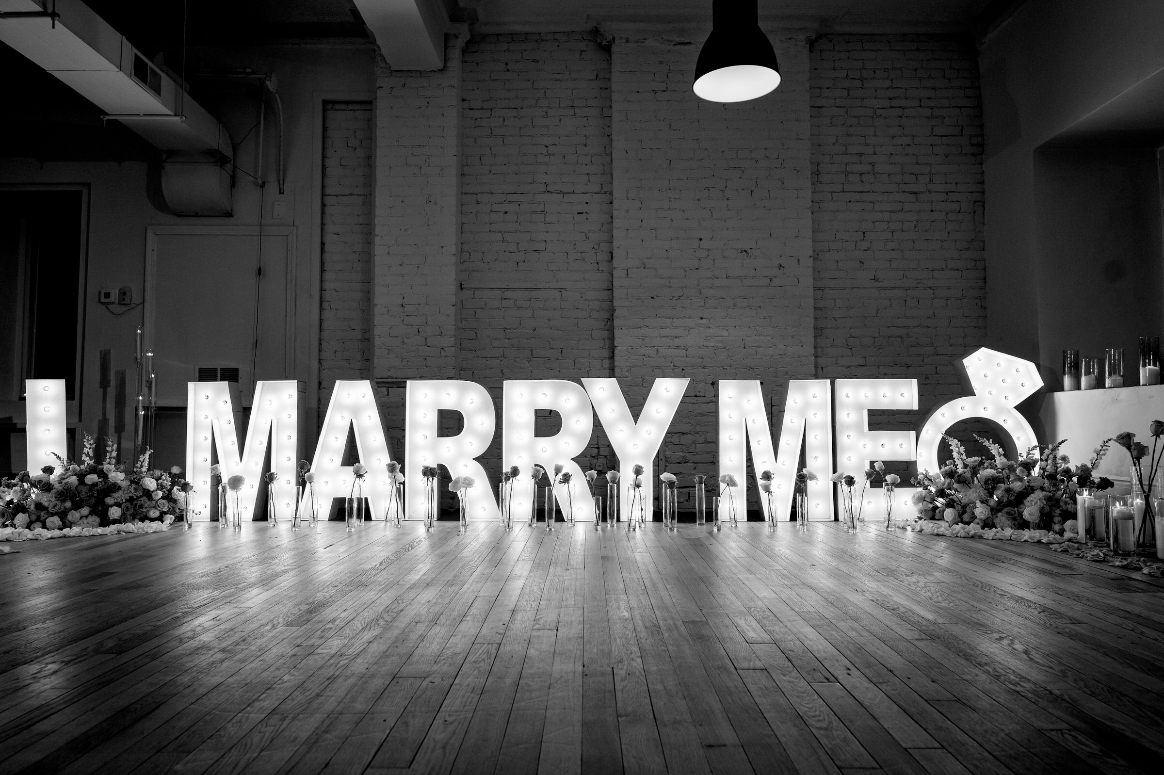 Marry me sign for Samantha during downtown Detroit Proposal 