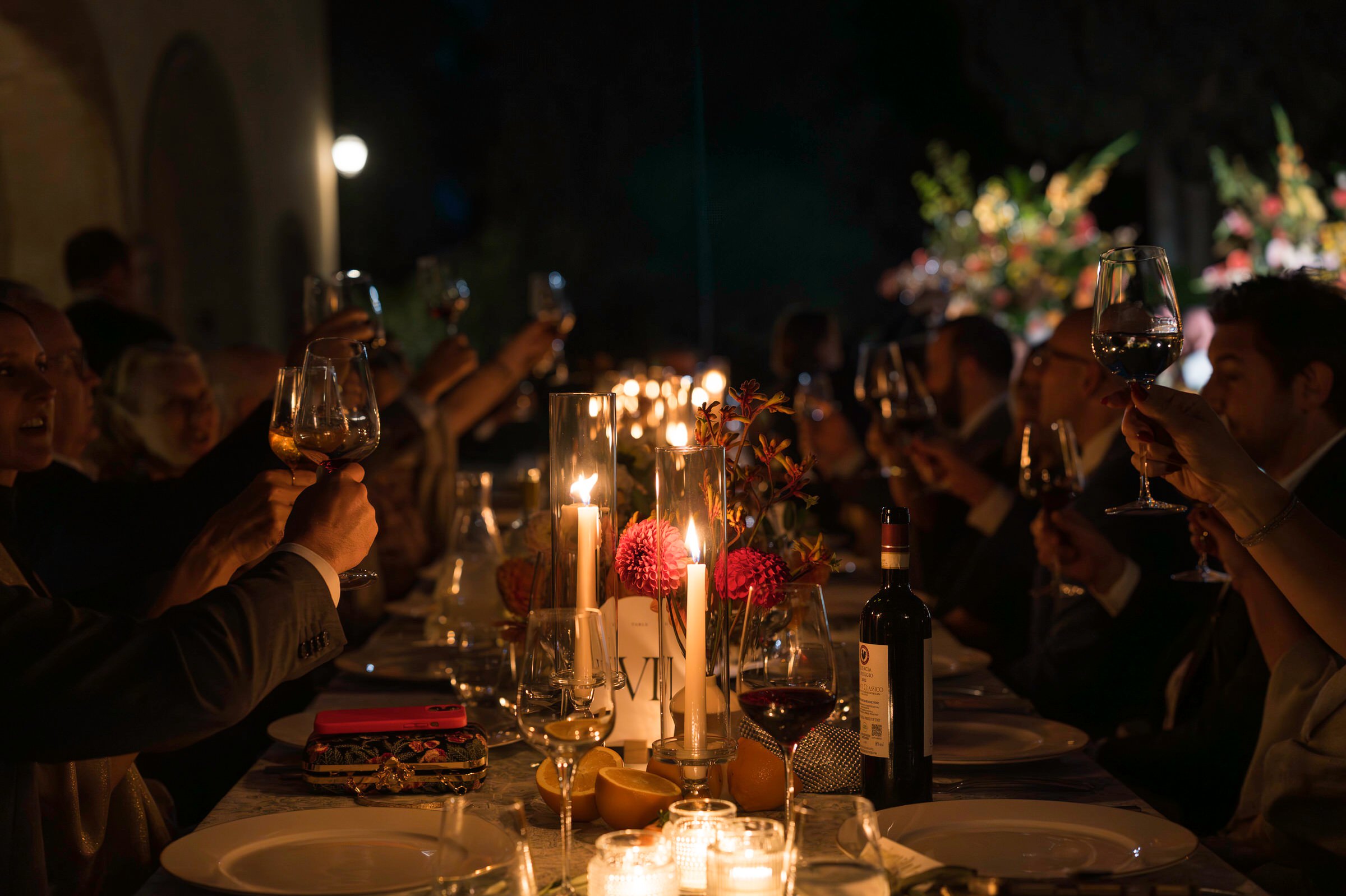 Glass cheers during Quercia al Poggio wedding