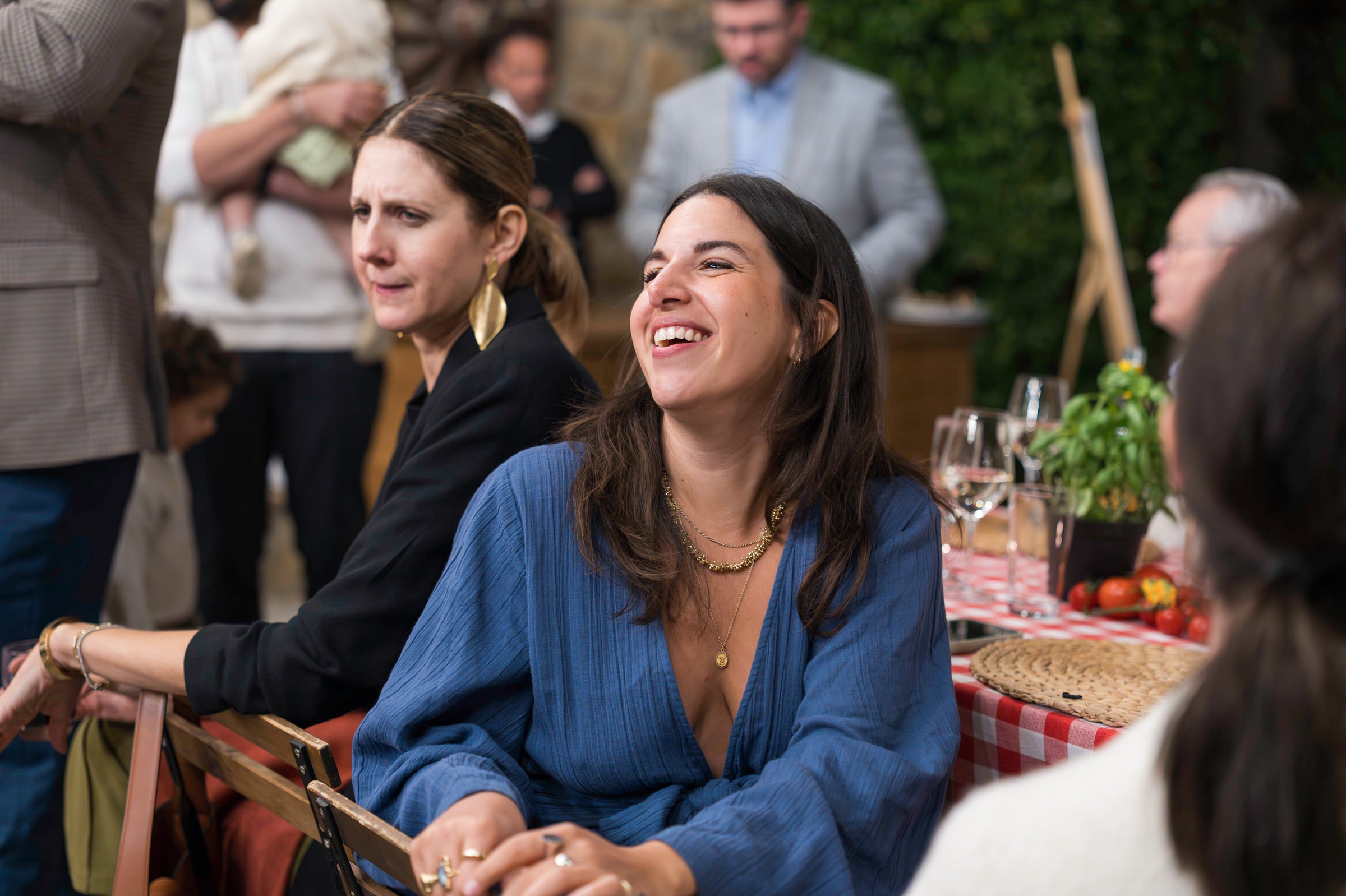 Guests laugh and react at Welcome Party at Quercia al Poggio 